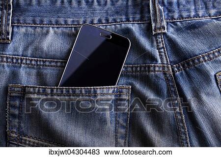 Smartphone in der Hosentasche einer Jeans View Large Photo Image Stock Image - Smartphone in der Hosentasche einer Jeans. Fotosearch