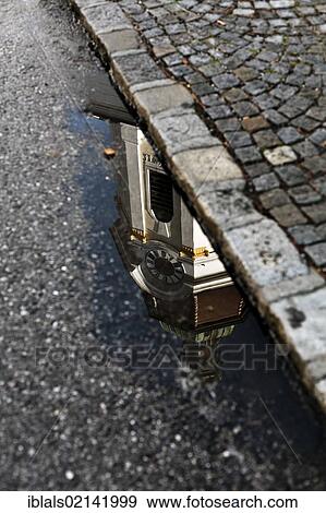 Stock Photo - Steinertor gate reflected in a puddle of water in Krems, Wachau, Lower Austria, Austria, Europe. Fotosearch