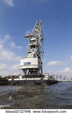 The most powerful floating crane in the Port of Hamburg, HHLA IV, Hamburg, Germany, Europe View Large Photo Image Stock Photograph - The most powerful floating crane in the Port of Hamburg, HHLA IV, Hamburg, Germany, Europe. Fotosearch