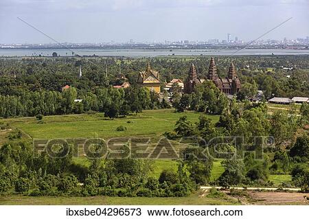 Turme des Prasat Phnom Reap Tempel, hinten Phnom Penh, Kambodscha, Asien View Large Photo Image Stock Image - Turme des Prasat Phnom Reap Tempel, hinten Phnom Penh, Kambodscha, Asien. Fotosearch