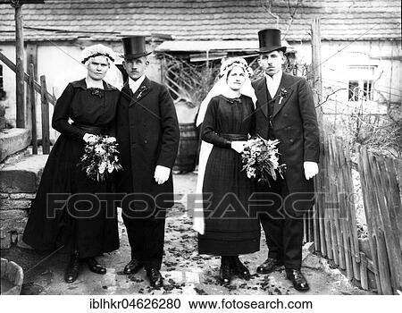 Stock Image - Two wedding couples ca. 1910, place unknown, Germany, Europe. Fotosearch