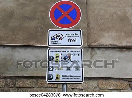 Verkehrsschilder, Halteverbot an einer Stromtankstelle fur Elektroautos mit Bedienungsanleitung fur die Zapfstelle, Meissen, Sachsen, Deutschland, Europa View Large Photo Image Stock Photo - Verkehrsschilder, Halteverbot an einer Stromtankstelle fur Elektroautos mit Bedienungsanleitung fur die Zapfstelle, Meissen, Sachsen, Deutschland, Europa. Fotosearch