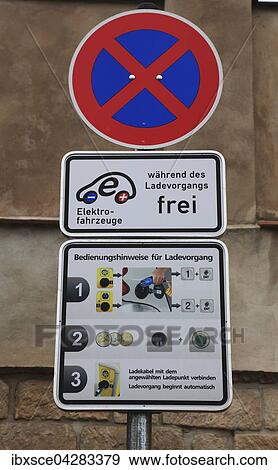 Verkehrsschilder, Halteverbot an einer Stromtankstelle fur Elektroautos mit Bedienungsanleitung fur die Zapfstelle, Meissen, Sachsen, Deutschland, Europa View Large Photo Image Stock Photo - Verkehrsschilder, Halteverbot an einer Stromtankstelle fur Elektroautos mit Bedienungsanleitung fur die Zapfstelle, Meissen, Sachsen, Deutschland, Europa. Fotosearch
