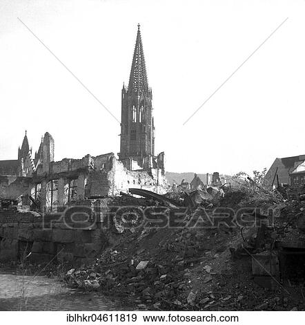 Stock Photo - View over ruins to the Freiburg Cathedral, ca. 1945, Freiburg, Germany, Europe. Fotosearch