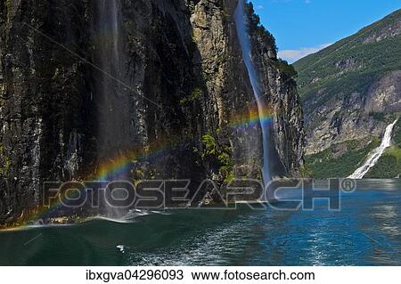 Wasserfalle Sieben Schwestern, links, und Der Freier, rechts, am Geirangerfjord, UNESCO-Weltnaturerbe Geirangerfjord bei Geiranger, Norwegen, Europa View Large Photo Image Stock Image - Wasserfalle Sieben Schwestern, links, und Der Freier, rechts, am Geirangerfjord, UNESCO-Weltnaturerbe Geirangerfjord bei Geiranger, Norwegen, Europa. Fotosearch