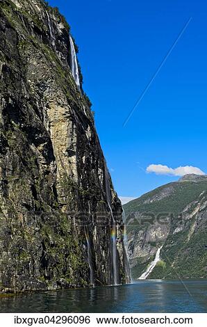 Wasserfalle Sieben Schwestern, und Der Freier am Geirangerfjord, UNESCO-Weltnaturerbe Geirangerfjord bei Geiranger, Norwegen, Europa View Large Photo Image Stock Photograph - Wasserfalle Sieben Schwestern, und Der Freier am Geirangerfjord, UNESCO-Weltnaturerbe Geirangerfjord bei Geiranger, Norwegen, Europa. Fotosearch