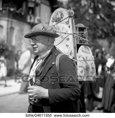 Stock Photography - Watch seller, man with watches, ca. 1955, Black Forest, Germany, Europe. Fotosearch