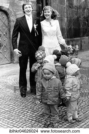 Picture - Wedding with 8 children ca. 1970s, exact place unknown, Czech Republic, Europe. Fotosearch