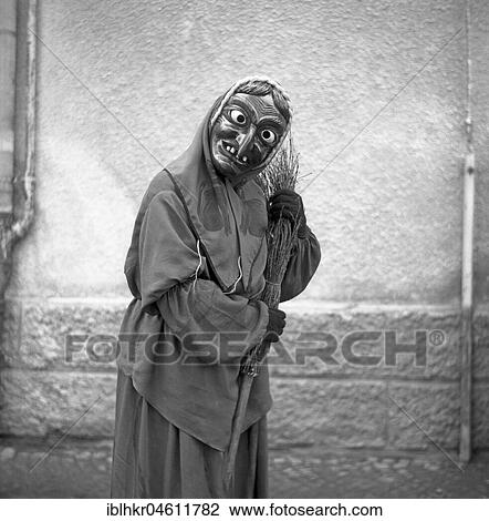 Witch with broom in hand, carnival, around 1950, surroundings of Freiburg, Germany, Europe View Large Photo Image Stock Image - Witch with broom in hand, carnival, around 1950, surroundings of Freiburg, Germany, Europe. Fotosearch