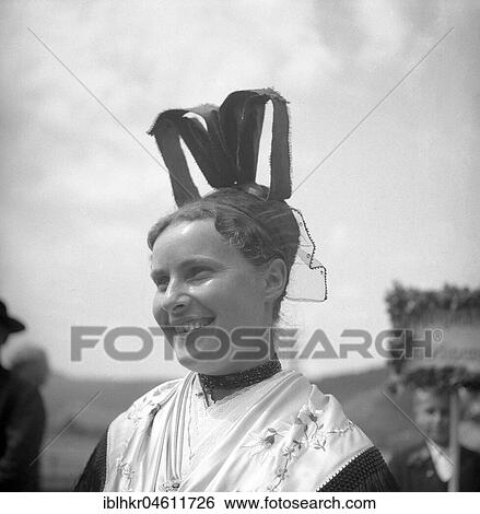 Woman in traditional traditional costume with hat, around 1950, near Freiburg, Germany, Europe View Large Photo Image Stock Photograph - Woman in traditional traditional costume with hat, around 1950, near Freiburg, Germany, Europe. Fotosearch