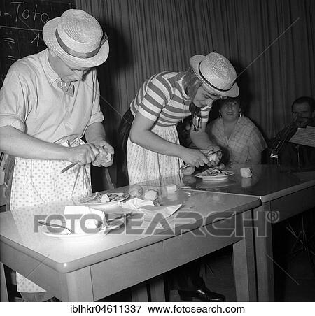 Women peeling and preparing potatoes, carnival, ca. 1955, Freiburg, Germany, Europe View Large Photo Image Stock Photo - Women peeling and preparing potatoes, carnival, ca. 1955, Freiburg, Germany, Europe. Fotosearch