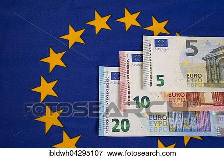 Bank notes, new euros on European flag View Large Photo Image Stock Photo - Bank notes, new euros on European flag. Fotosearch