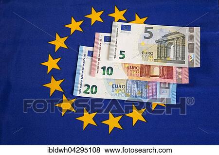 Bank notes, new euros on European flag View Large Photo Image Stock Photo - Bank notes, new euros on European flag. Fotosearch