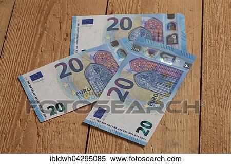 Bank notes on wood, twenty euros, release date 25/11/2015 View Large Photo Image Stock Photography - Bank notes on wood, twenty euros, release date 25/11/2015. Fotosearch
