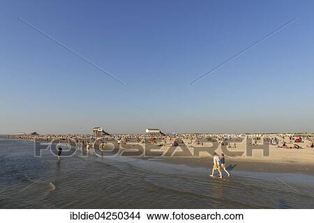 Picture - Bathers on the beach, Sankt Peter-Ording, North Frisia, Schleswig-Holstein, Germany, Europe. Fotosearch