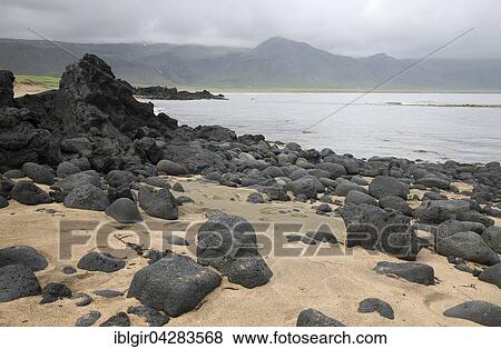 Beach with large volcanic rocks, Budir, Iceland, Europe View Large Photo Image Stock Photo - Beach with large volcanic rocks, Budir, Iceland, Europe. Fotosearch