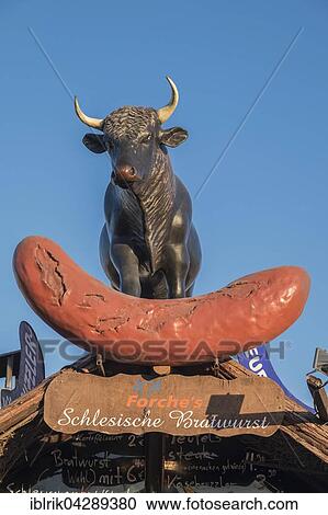 Stock Image - Beef and sausage, stall, Tollwood Christmas Market, Theresienwiese, Munich, Germany, Europe. Fotosearch