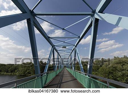 Blue bridge over the Ruhr, footbridge, former Ruhrtalbahnbrucke, Styrum, Mulheim an der Ruhr, Ruhr district, North Rhine-Westphalia, Germany, Europe View Large Photo Image Stock Image - Blue bridge over the Ruhr, footbridge, former Ruhrtalbahnbrucke, Styrum, Mulheim an der Ruhr, Ruhr district, North Rhine-Westphalia, Germany, Europe. Fotosearch