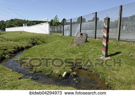 Border post of GDR border to the former GDR, the rest of the wall and barrier in the divided village Modlareuth, German-German Museum Modlareuth, Bavaria, Thuringia, Germany, Europe View Large Photo Image Stock Image - Border post of GDR border to the former GDR, the rest of the wall and barrier in the divided village Modlareuth, German-German Museum Modlareuth, Bavaria, Thuringia, Germany, Europe. Fotosearch