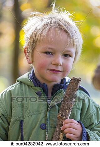 Boy with stick, 3 years, autumn, Saxony, Germany, Europe View Large Photo Image Stock Image - Boy with stick, 3 years, autumn, Saxony, Germany, Europe. Fotosearch