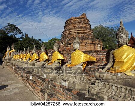 Buddha statues in front of the Central Stupa, Wat Yai Chai Mongkhon, Thailand, Asia View Large Photo Image Stock Photograph - Buddha statues in front of the Central Stupa, Wat Yai Chai Mongkhon, Thailand, Asia. Fotosearch