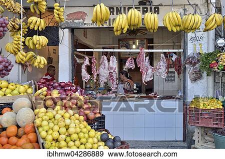 Butcher shop with fruit stand, market, Taxco de Alarcon, Guerrero, Mexico, North America View Large Photo Image Stock Photo - Butcher shop with fruit stand, market, Taxco de Alarcon, Guerrero, Mexico, North America. Fotosearch