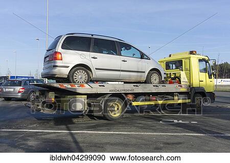 Car on tow-away vehicle, motorway lay-by, Bavaria, Germany, Europe View Large Photo Image Stock Image - Car on tow-away vehicle, motorway lay-by, Bavaria, Germany, Europe. Fotosearch