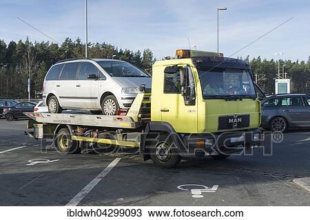 Car on tow-away vehicle, motorway lay-by, Bavaria, Germany, Europe View Large Photo Image Stock Image - Car on tow-away vehicle, motorway lay-by, Bavaria, Germany, Europe. Fotosearch