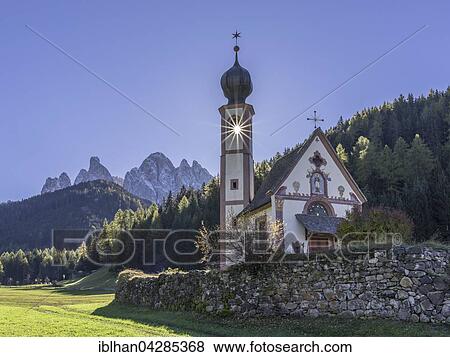 Stock Photo - Chapel of St. Johann with Odle, Villnoss, Province of South Tyrol, Italy, Europe. Fotosearch