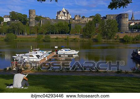 Stock Photograph - Chateau d'Angers, castle and harbour on the Maine river, Angers, Maine-et-Loire, Anjou, Pays de la Loire, Loire Valley, UNESCO World Heritage Site, France, Europe. Fotosearch
