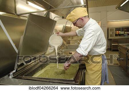 Chef stirring a large cooking vessel, canteen kitchen, Catering, Germany, Europe View Large Photo Image Picture - Chef stirring a large cooking vessel, canteen kitchen, Catering, Germany, Europe. Fotosearch