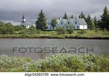 Stock Photo - Church and houses, Thingvellir, Hvalfjorour, Iceland, Europe. Fotosearch