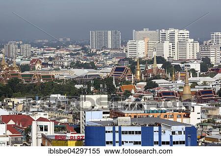 Stock Photography - City view, looking west, Wat Phra Kaeo and Royal Palace, skyscrapers, panoramic view from Grand China Hotel, Chinatown, Bangkok, Thailand, Asia. Fotosearch