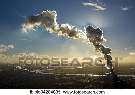 Coal plant Kraftwerk Duisburg-Walsum in front of the Rhine, backlit, cloud of smoke, emissions, Ruhr district, Duisburg, North Rhine-Westphalia, Germany, Europe View Large Photo Image Stock Photography - Coal plant Kraftwerk Duisburg-Walsum in front of the Rhine, backlit, cloud of smoke, emissions, Ruhr district, Duisburg, North Rhine-Westphalia, Germany, Europe. Fotosearch