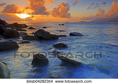 Colourful sunset at Anse Soleil, Mahe Island, Seychelles, Africa View Large Photo Image Picture - Colourful sunset at Anse Soleil, Mahe Island, Seychelles, Africa. Fotosearch