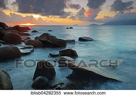 Colourful sunset at Anse Soleil, Mahe Island, Seychelles, Africa View Large Photo Image Stock Photography - Colourful sunset at Anse Soleil, Mahe Island, Seychelles, Africa. Fotosearch