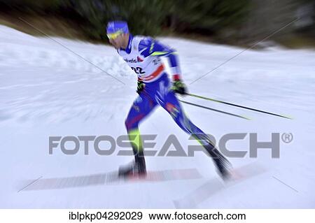 Cross-country skier in motion, FIS Cross-Country World Cup Davos, Switzerland, Europe View Large Photo Image Stock Photo - Cross-country skier in motion, FIS Cross-Country World Cup Davos, Switzerland, Europe. Fotosearch