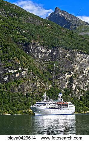 Cruise ship MS Astor in Geirangerfjord, Geiranger, Norway, Europe View Large Photo Image Stock Image - Cruise ship MS Astor in Geirangerfjord, Geiranger, Norway, Europe. Fotosearch