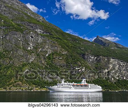 Cruise ship MS Astor in Geirangerfjord, Geiranger, Norway, Europe View Large Photo Image Stock Image - Cruise ship MS Astor in Geirangerfjord, Geiranger, Norway, Europe. Fotosearch