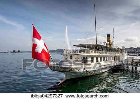 Cruise vessel with swiss flag on Lake Geneva, Geneva, Switzerland, Europe View Large Photo Image Stock Photo - Cruise vessel with swiss flag on Lake Geneva, Geneva, Switzerland, Europe. Fotosearch