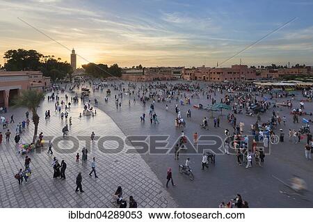 Stock Image - Djemaa el Fnaa square at dusk, Marrakech, Morocco, Africa. Fotosearch