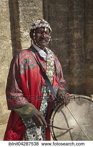 Drummer in front of the Necropolis of Chellah, Rabat Rabat province, Morocco, Africa View Large Photo Image Stock Photo - Drummer in front of the Necropolis of Chellah, Rabat Rabat province, Morocco, Africa. Fotosearch