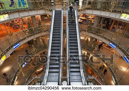 Escalators and Christmas decorations in the shopping center, City Point, Nuremberg, Bavaria, Germany, Europe View Large Photo Image Stock Photograph - Escalators and Christmas decorations in the shopping center, City Point, Nuremberg, Bavaria, Germany, Europe. Fotosearch