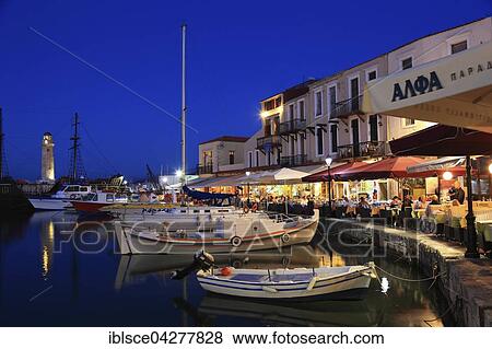 Evening mood, boats and restaurants in Venetian harbour, Rethymno, Crete, Greece, Europe View Large Photo Image Stock Photo - Evening mood, boats and restaurants in Venetian harbour, Rethymno, Crete, Greece, Europe. Fotosearch
