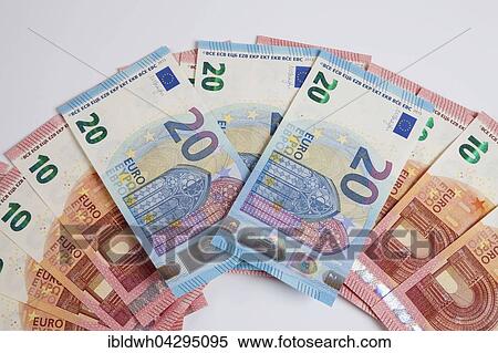 Fan of bank notes, twenty Euros, release date 25/11/2015, ten Euros, release date 23/09/2014 View Large Photo Image Stock Photography - Fan of bank notes, twenty Euros, release date 25/11/2015, ten Euros, release date 23/09/2014. Fotosearch