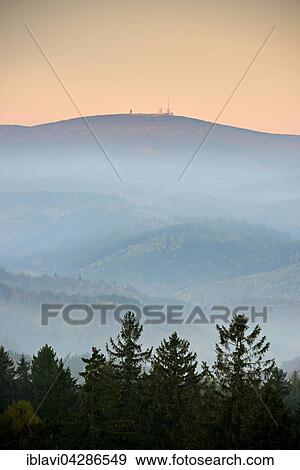 Stock Photo - Forest and valleys in Harz, view towards Brocken, morning light, Wernigerode, Saxony-Anhalt, Germany, Europe. Fotosearch