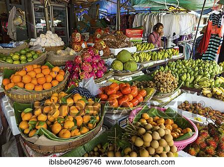 Stock Photograph - Fruit stall on the Khan Daun Penh market in Phnom, Cambodia, Asia. Fotosearch