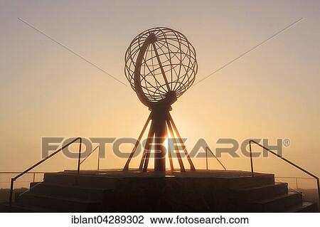 Stock Image - Globe on the North Cape platform Nordkapplataet, midnight sun, Nordkapp, Mageroya, Finnmark County, Norway, Europe. Fotosearch