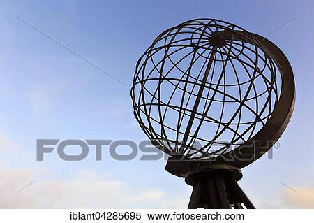 Stock Photography - Globe on the North Cape platform against a blue sky, Nordkapplataet, Nordkapp, Mageroya, Finnmark County, Norway, Europe. Fotosearch