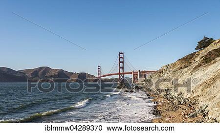 Stock Image - Golden Gate Bridge, Marshall's Beach, rocky coast, San Francisco, USA, North America. Fotosearch